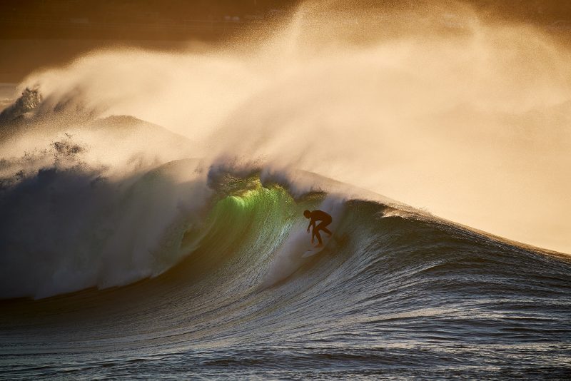 The most photographed human at Bondi, Chris Little taking a bomb