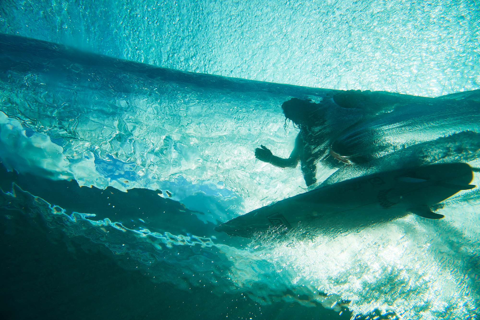 Adrien Toyon under the lip this morning at Teahuppo