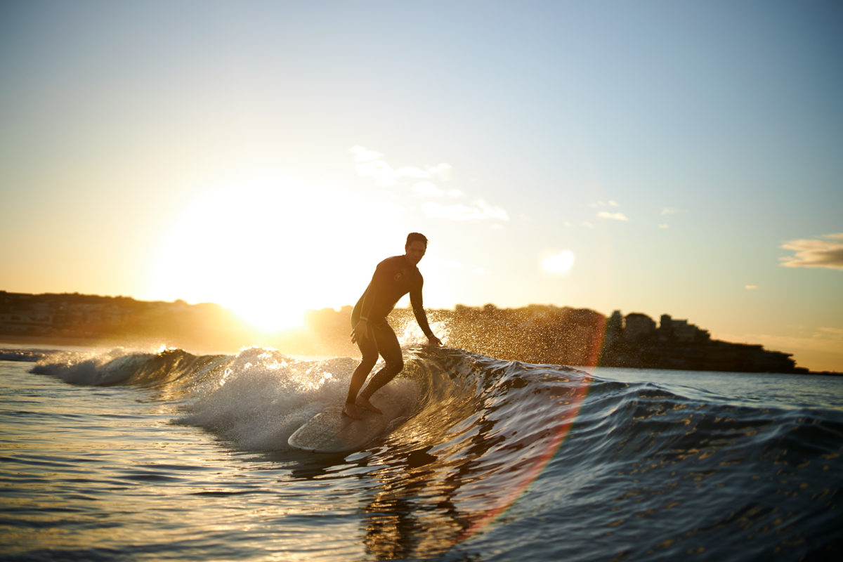 Isaac, ridding a 12 foot log, cruising, Bondi