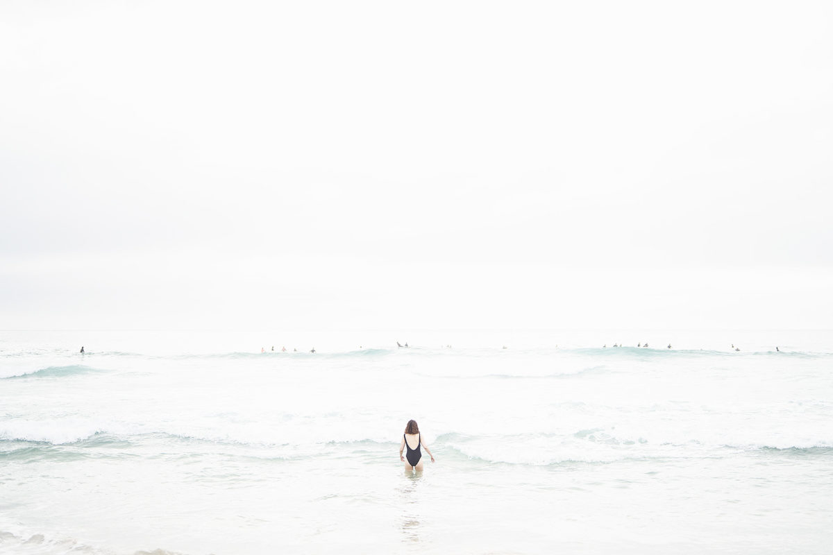 Muted skies, dribbly surf, warm water