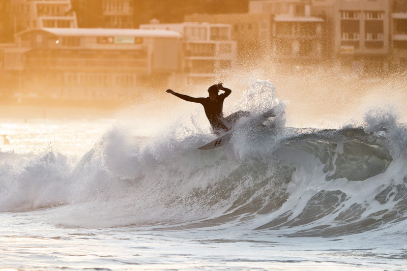 Grayson Hinrichs destroying lips in glorious backlit golds, Bondi