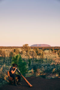 A Noongar man plays the Didgeridoo at sunset, Tali Wiru