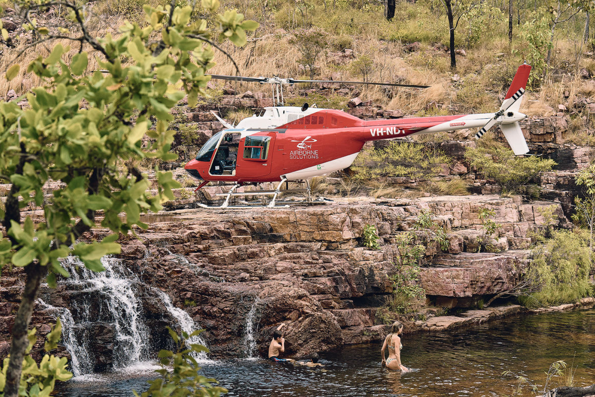 They use helis like cars in the territory. Park at a creek for a swim. Near Wangi Falls