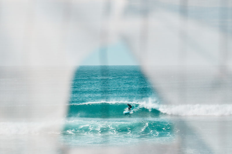 Bondi - waves in-between fences and rain squalls