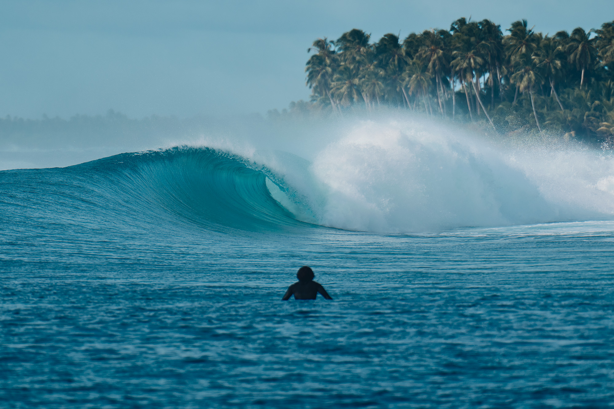 Minherl, minding surfing the nugget. Laamu Atoll, Maldives